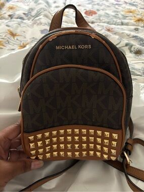 Michael Kors Brown MK Monogram Mini Backpack with Gold Studs